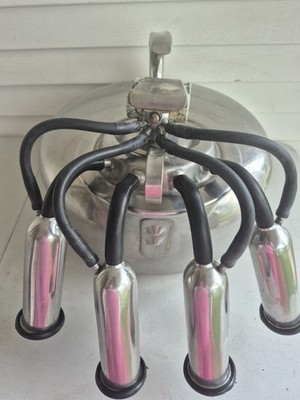 SURGE MILKER FOR MILKING GOATS,COW,SHEEP,NEW RUBBER HOSE AND INFLATIONS ON SHELL
