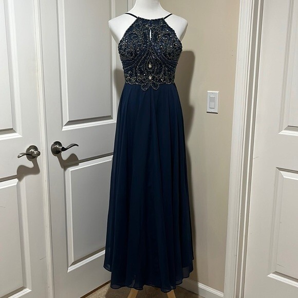 black jersey formal dress Black jersey dress with crystal chainmail on the neckline and sleeves main image 1