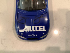 JIMMIE JOHNSON AUTOGRAPHED 2000 ALLTEL ROOKIE DIECAST & CARD - NAME ERROR CAR