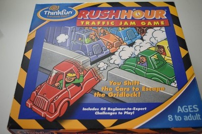 Think Fun Rush Hour game plus three expansion packs
