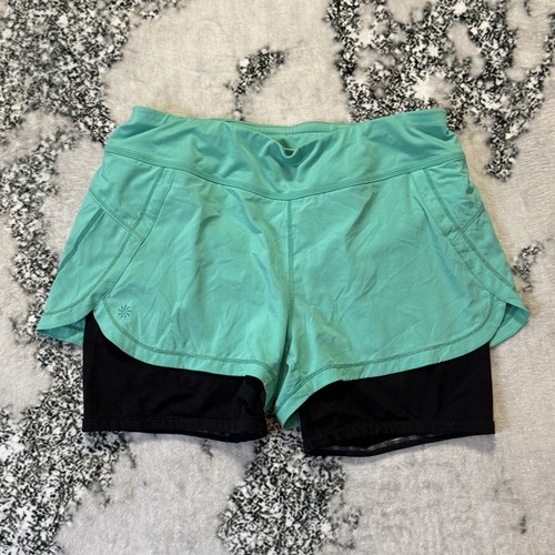 Athleta Shorts Damen Größe M grün gefüttert Laufen Stretch Kompression Crossover