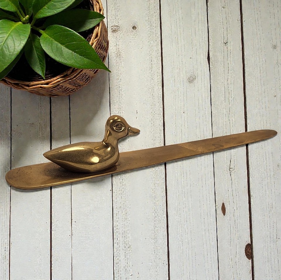 Heavy solid-brass duck letter opener with heritage finish — chunky, sculptural, and way more personality than a plain blade.