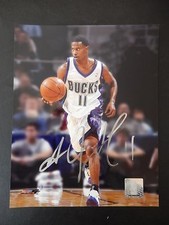 T. J. Ford Autographed 8