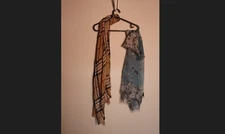 Set of two scarves, one brown plaid rectangle and one blue floral semi opaque