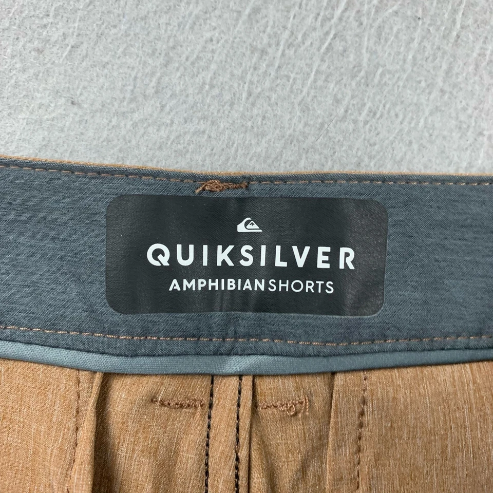 Pantalones Cortos Quiksilver Para Hombre 30 Beige Calce Regular Frente Plano Anfibio Chino Nuevos con Etiquetas Foto 2 de 4