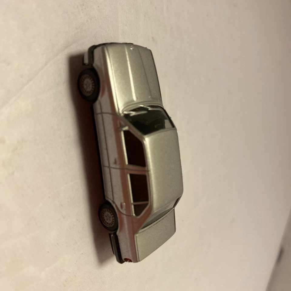 Coche vintage Herpa plateado BMW 325i escala 1:87 con Alemania Foto 4 de 4