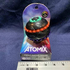 New Atomix Puzzle Sphere Game Brainteaser Fidget Toy for One Player Hasbro Kids