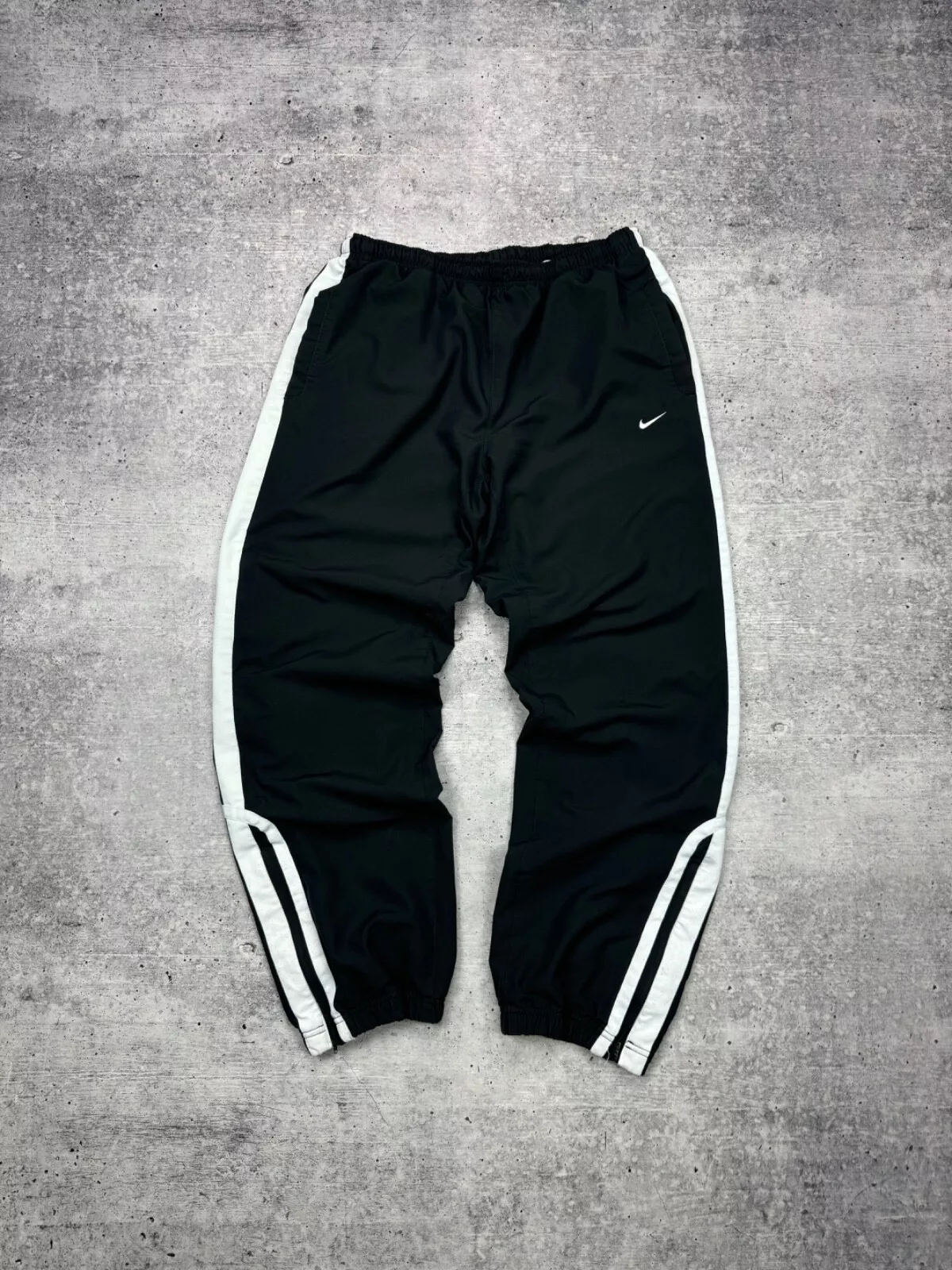 Pantalon de jogging vintage Nike Swoosh logo nylon percé rayé style 2000 XL