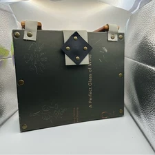 Pocketbook and Pages is a one of a kind bag made from old books.