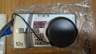 Panasonic デジタルカメラ LUMIX TZ DMC-TZ1-S Panasonic LUMIX DMC-TZ1-S Silver Compact Digital Camera Tested