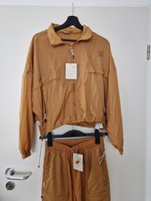 PUMA INFUSE WOVEN TRACK JACKE Damen Relaxed Fit Gr. L / S Ockerbraun Zustand NEU