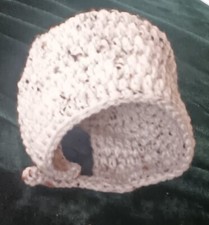 Handmade crochet white flecked baby bonnet with buttons