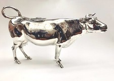 A UNIQUE CIRCA 1891 ENGLISH STERLING SILVER & RUBY EYES 11