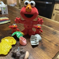 Sesame Street Elmo s World Silly Parts Talking Figure