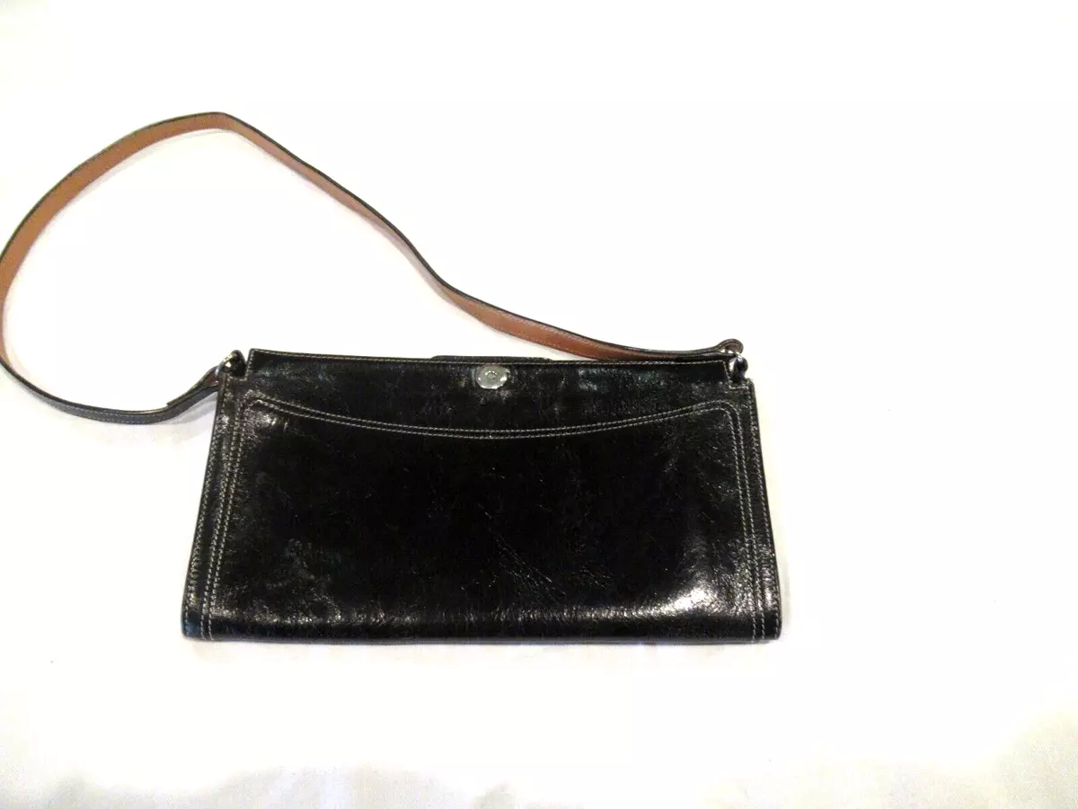 Tusk black leather purse handbag pocketbook folds closed at the top