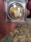 1884-O rainbow toned Morgan Silver Dollar PCGS MS64