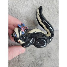 Vintage Ceramic Skunk Figurine With Butterfly Accent Cute Animal Collectible