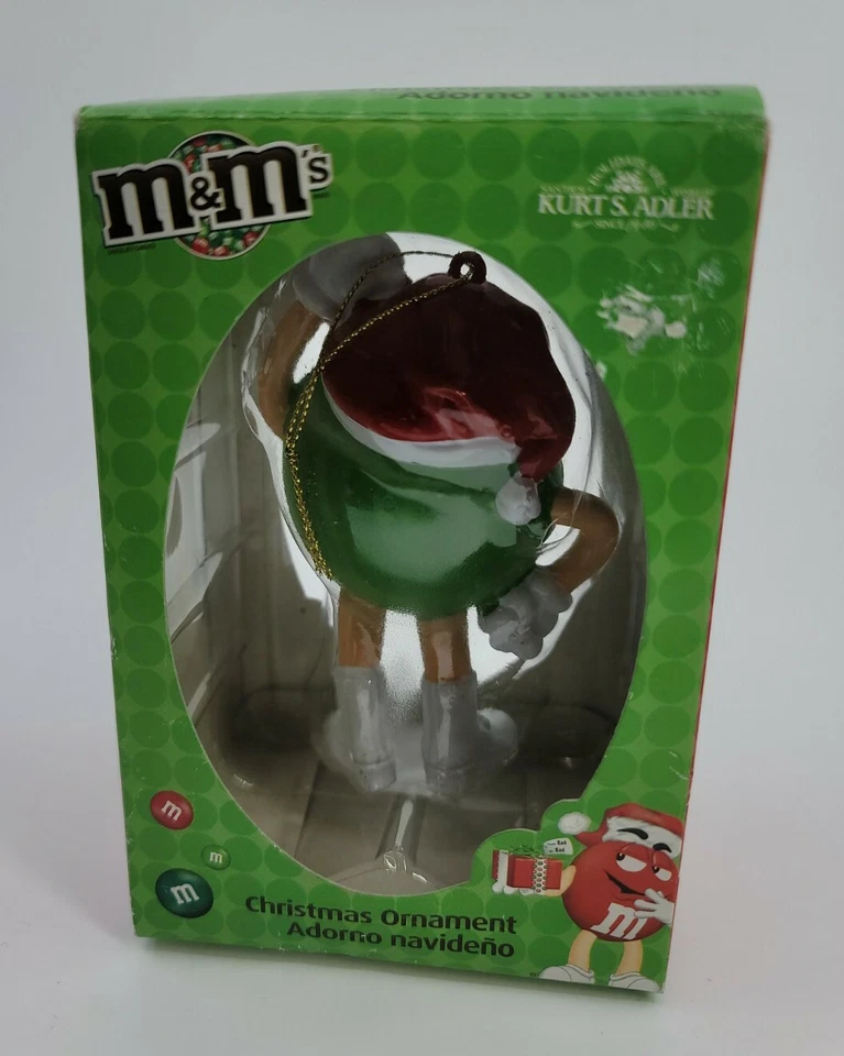 Коллекционное рождественское праздничное украшение Kurt Adler: зеленое M&M в шляпе Санта-Клауса - Изображение 2 из 4