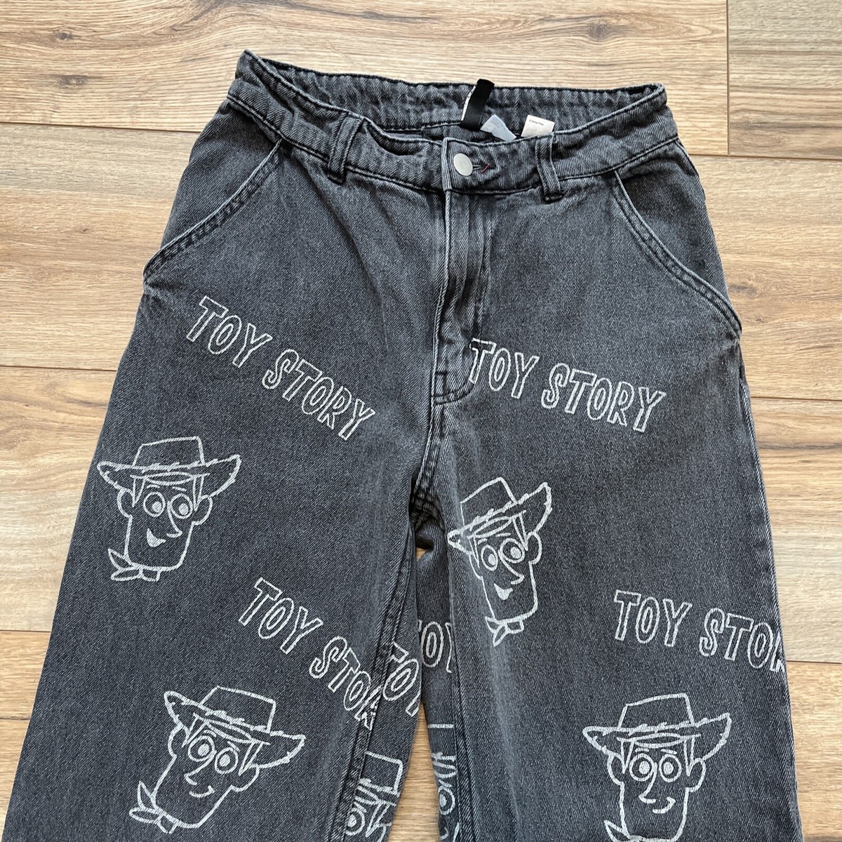 H&M Divided Toy Story Print Denim Jeans SZ 2 Black Baggy