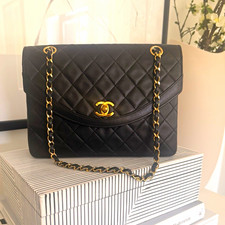 CHANEL Classic Flap Black Quilted Leather Shoulder Bag Gold Hardware Red Lining