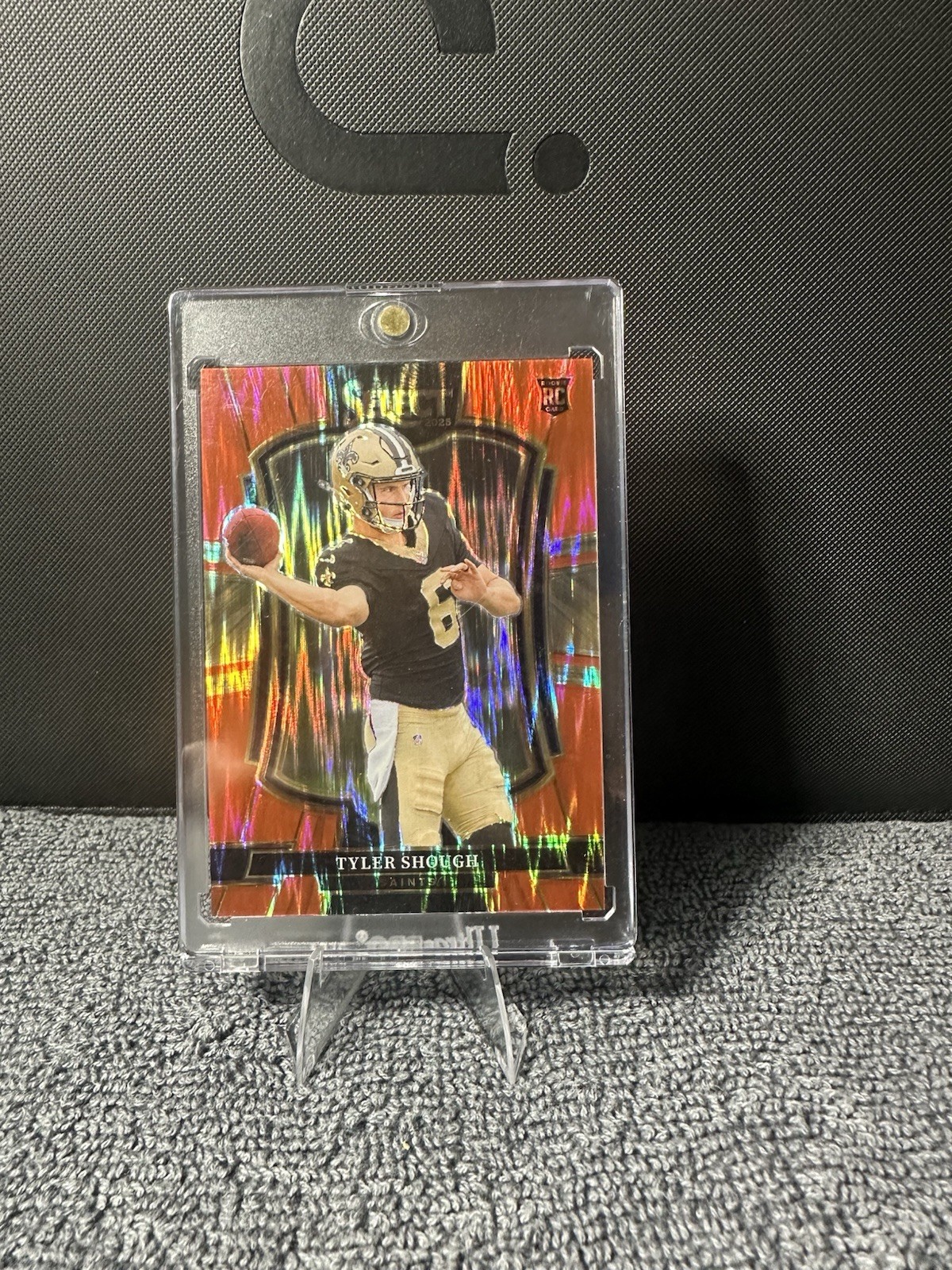 Panini 2025 Select Red Shock Prizm RC Tyler Shough Saints #141/249