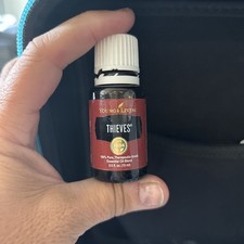 Young Living Thieves 15 Ml Essential Oil Open 3/4 Full