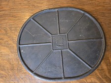 Antique Oval cast iron plunger or pressing pl...