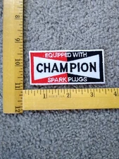 EQUIPPED WITH  CHAMPION SPARK PLUGS RACING LOGO IRON ON PATCH