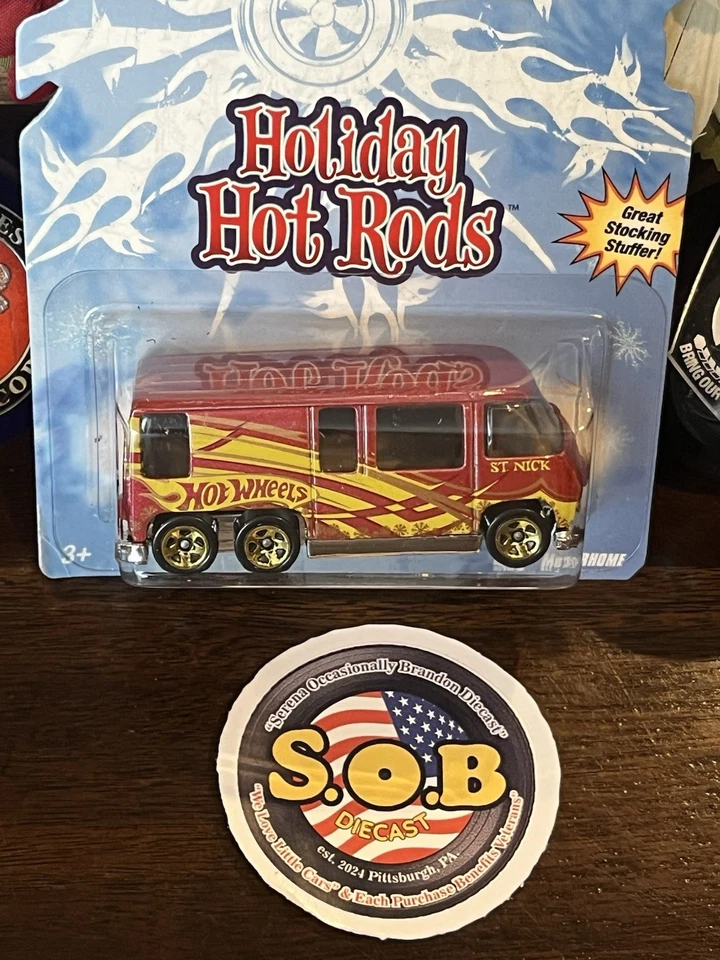Autocaravana GMC Hot Wheels 1976 roja con llamas diecast sellada casi nueva Foto 3 de 4