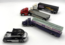 Lot of Four 4 Die Cast Plastic Trucks Trailers Maisto Hot Wheels Ford