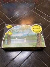 tuco miniature round picture puzzle quiet river