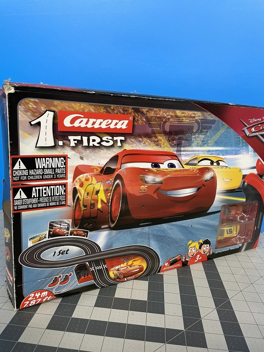 Carrera First Disney/Pixar Cars - Slot Car Race Track - Includes 2 Cars:  Lightning McQueen and Jackson Storm - Battery-Powered Beginner Racing Set  for