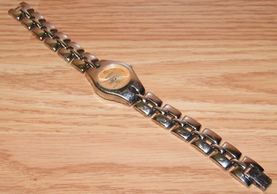 Armitron (Y121E) 100FT Water Resistant Silver Tone Band / Peach Face Watch *READ