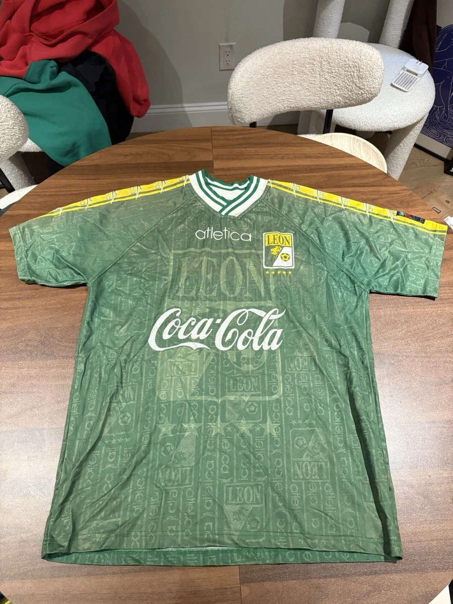 Preços baixos em Leon Masculino International Club Camisas de