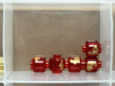 LEGO Parts - Trans-Red Minifigure, Head wo Face Gold Rabbit - No 28621 ...