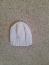 New hand knitted white cable border baby hat size 0-3 months