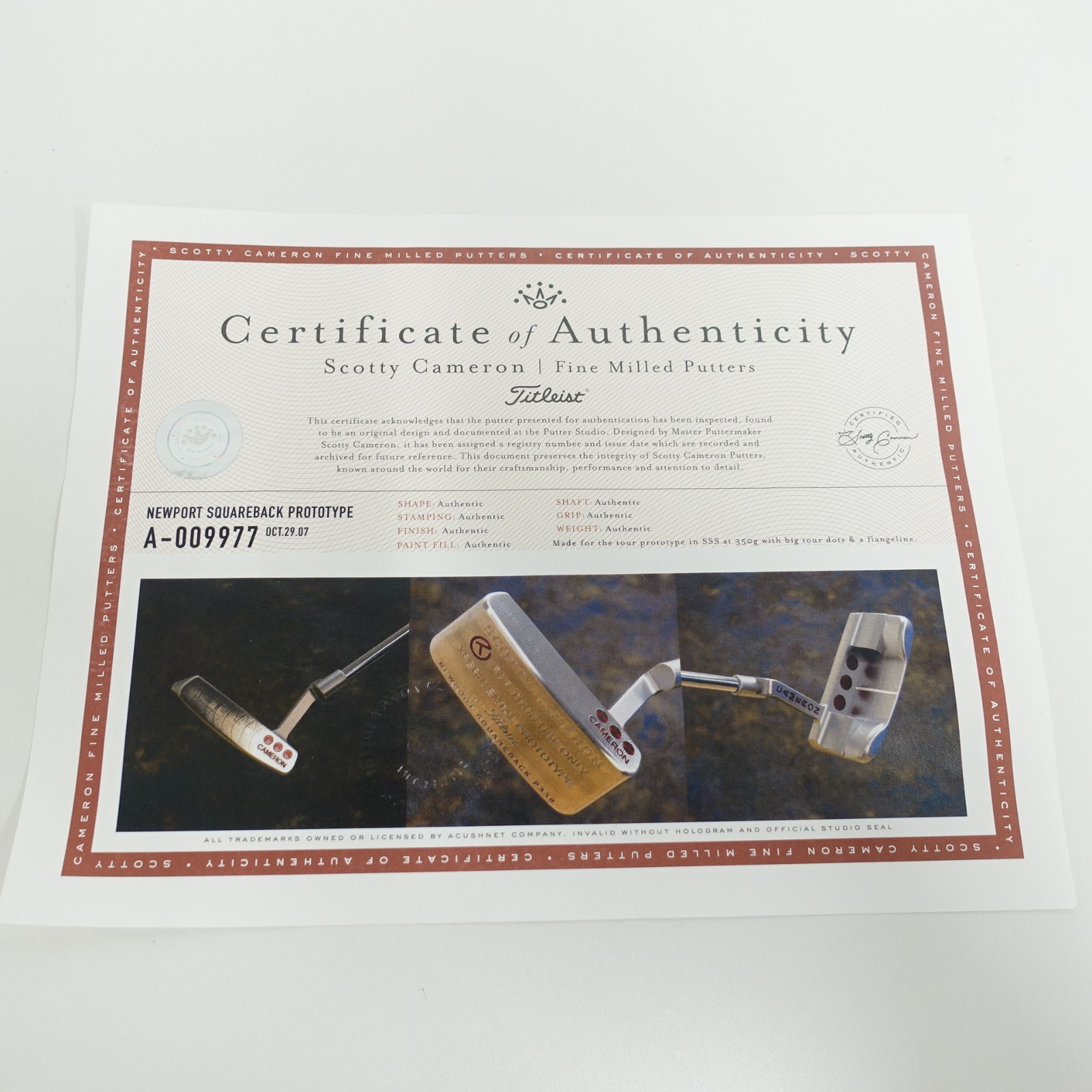 A009977, the certificate in an eBay listing's photos