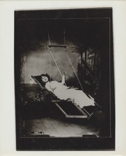 PHOTO OF BEAUTIFUL WOMAN ON UNUSUAL SWING FROM NEGATIVE ON PHOTO PAPER