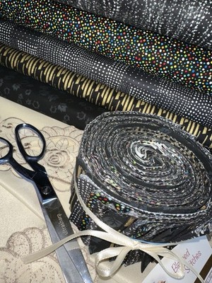 Jelly Roll Assorted black/gold/silver-40 strips 2.5'' 100% cotton
