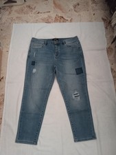 Jeans blu con strappi donna