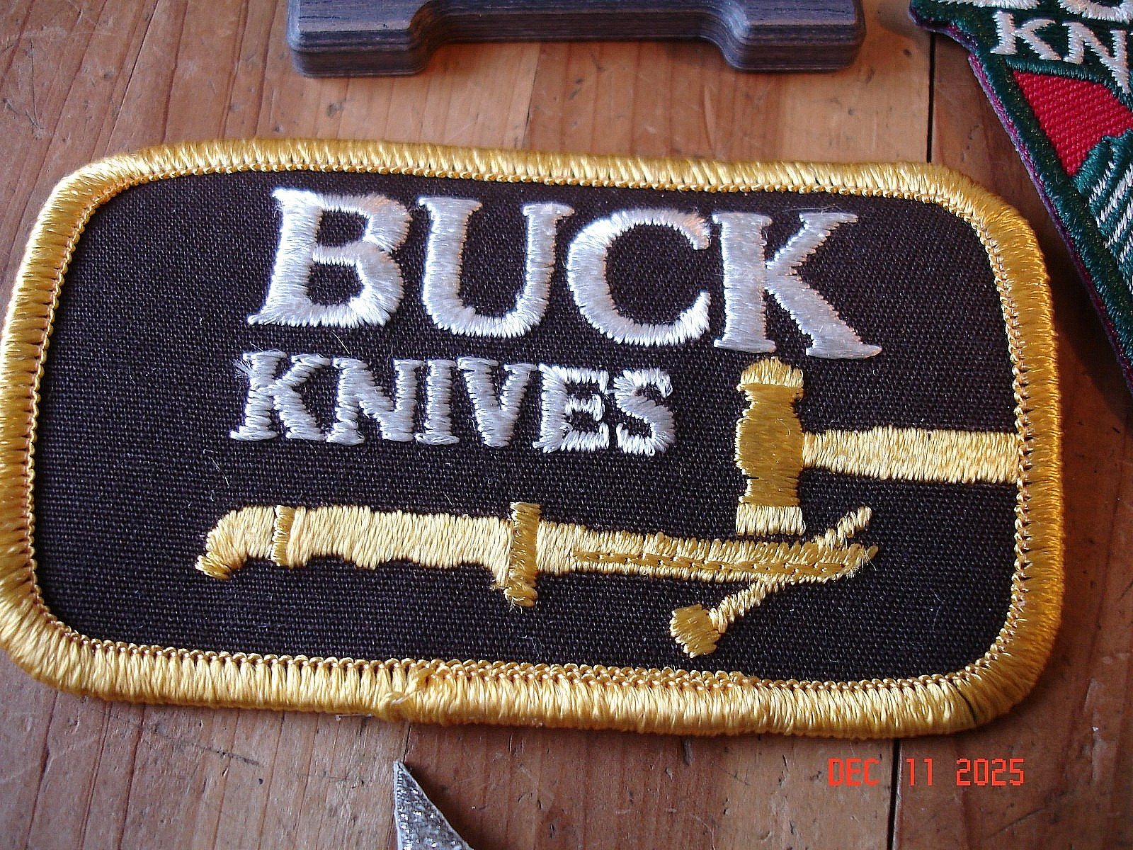 NEW BUCK KNIFE GOODIES 2 CHRISTMAS TREE ORNAMENTS 8 HAT PINS 3 PATCHES