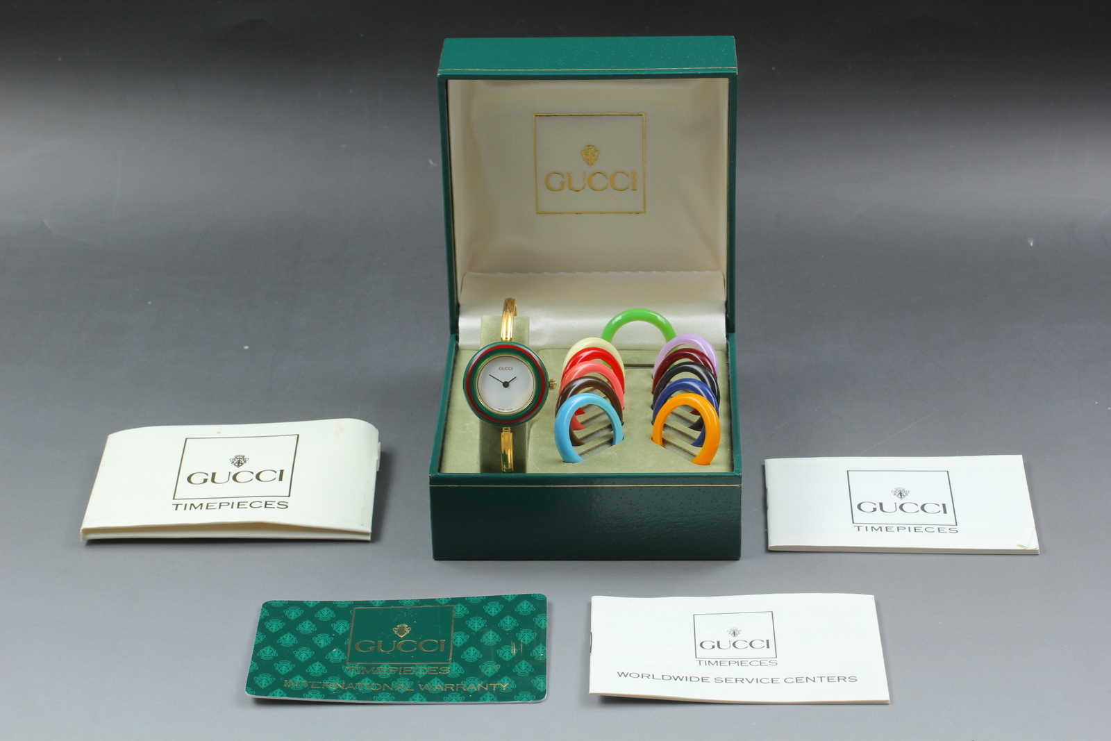 New Batt [MINT w/Paper] Gucci 11/12.2 12 Colors Change Bezel Gold Qz Women Watch