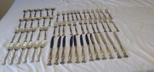 WALLACE STERLING SILVER PATTERN IS ROMANCE OF THE SEA. SERVING FOR 12, 70 PIECES
