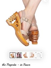 Lucky Lou. The Pagoda Fawn Carved-Wood Wedge ...