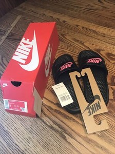 nike benassi slides pink and black