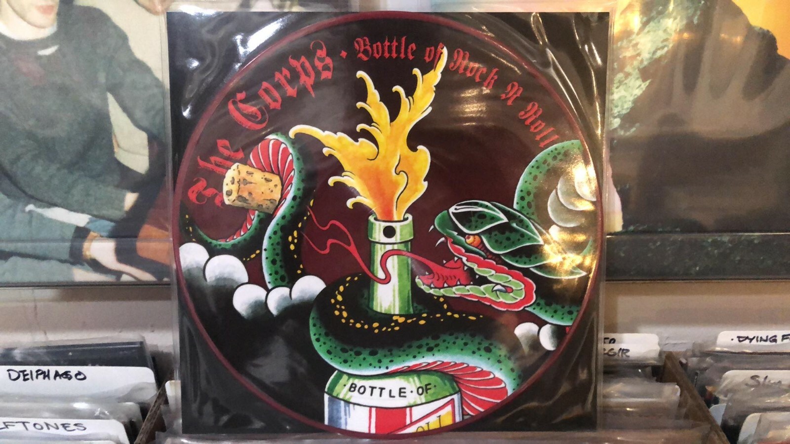 Диск The Corps Bottle Of Rock N Roll с 10 картинками (Новый/Запечатанный винил) - редкость!