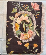 Vintage fabric-covered three-ring binder used as a photo album or scrapbook