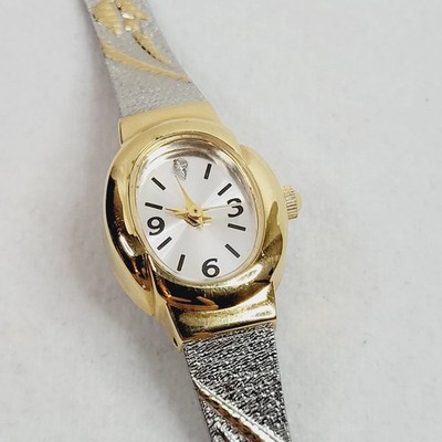 Avon Two Tone Wrist Watch Embossed Tulip Flower Band Design Working Adjustable
