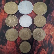 Moneta 2xDDR8xFrancja z obiegu używana, ze śladami użytkowania.