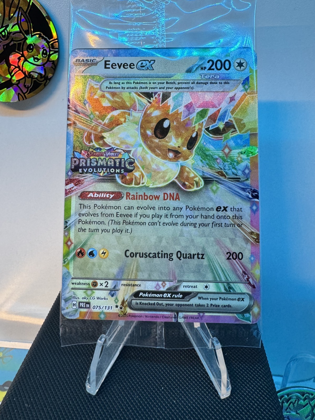 Eevee EX 075/131 Prismatic Evolutions Stamped Pokemon Card - NM SEALED